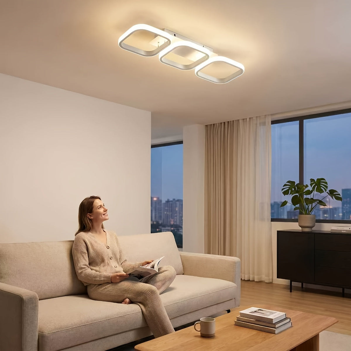 White three frame LED ceiling light above a neutral living room.