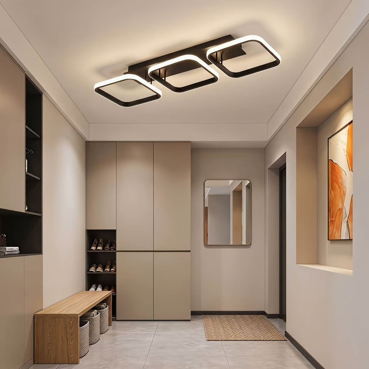 Black three frame LED ceiling light above an interior hallway.