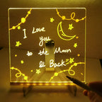 Clear illuminated acrylic drawing board with a handwritten moon and stars message