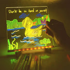 Hand drawing a colorful duck scene on the illuminated acrylic panel