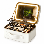 Open white small makeup case with illuminated removable mirror