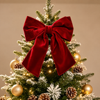 Large Red Velvet Christmas Bow — red bow at the top of a small tree