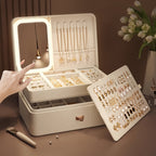 Jewelry box with its LED mirror lit on a dressing table