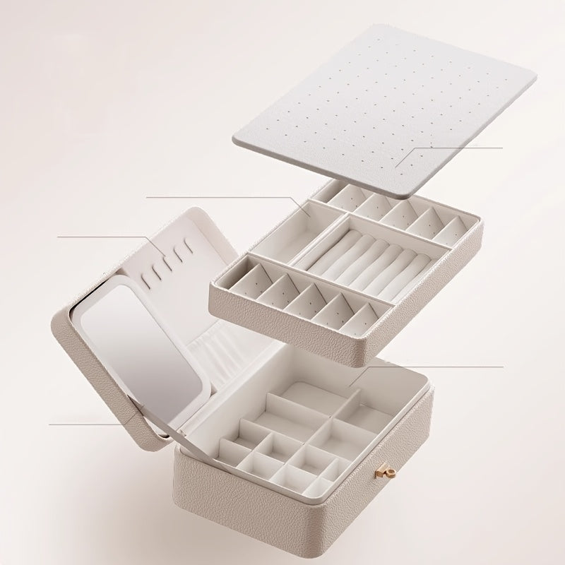 Jewelry box showing its layered removable tray construction