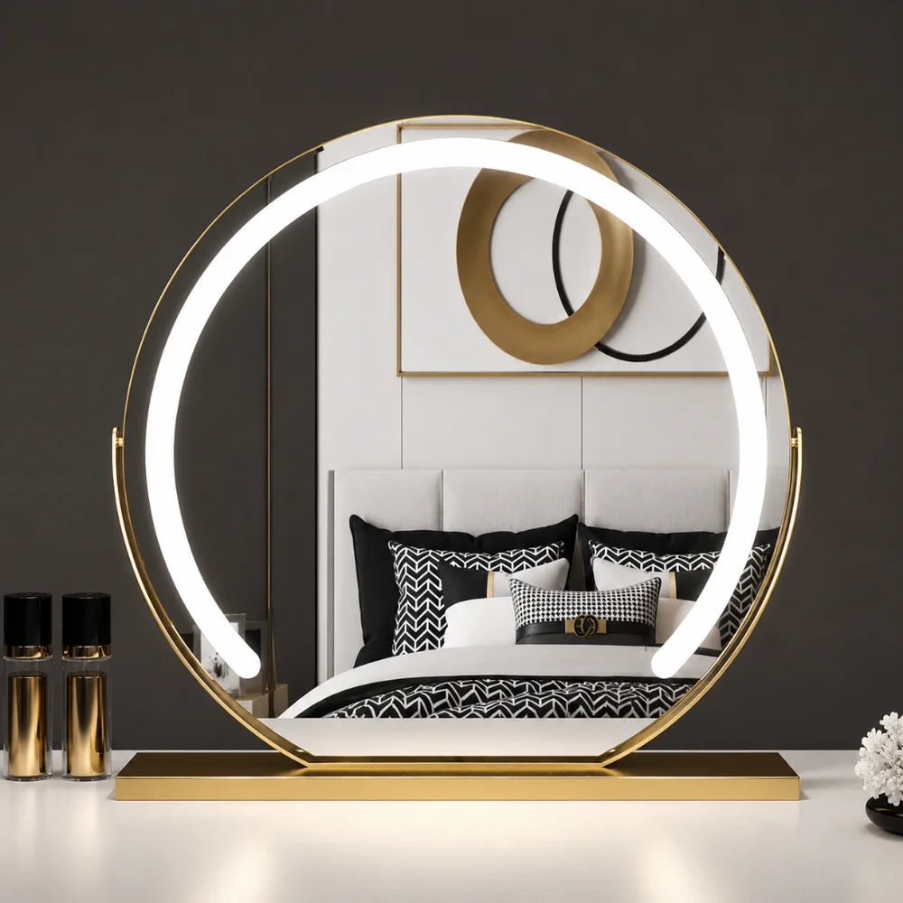 Lighted makeup mirror shown with its power adapter and cable.