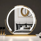 Lighted makeup mirror shown with its power adapter and cable.