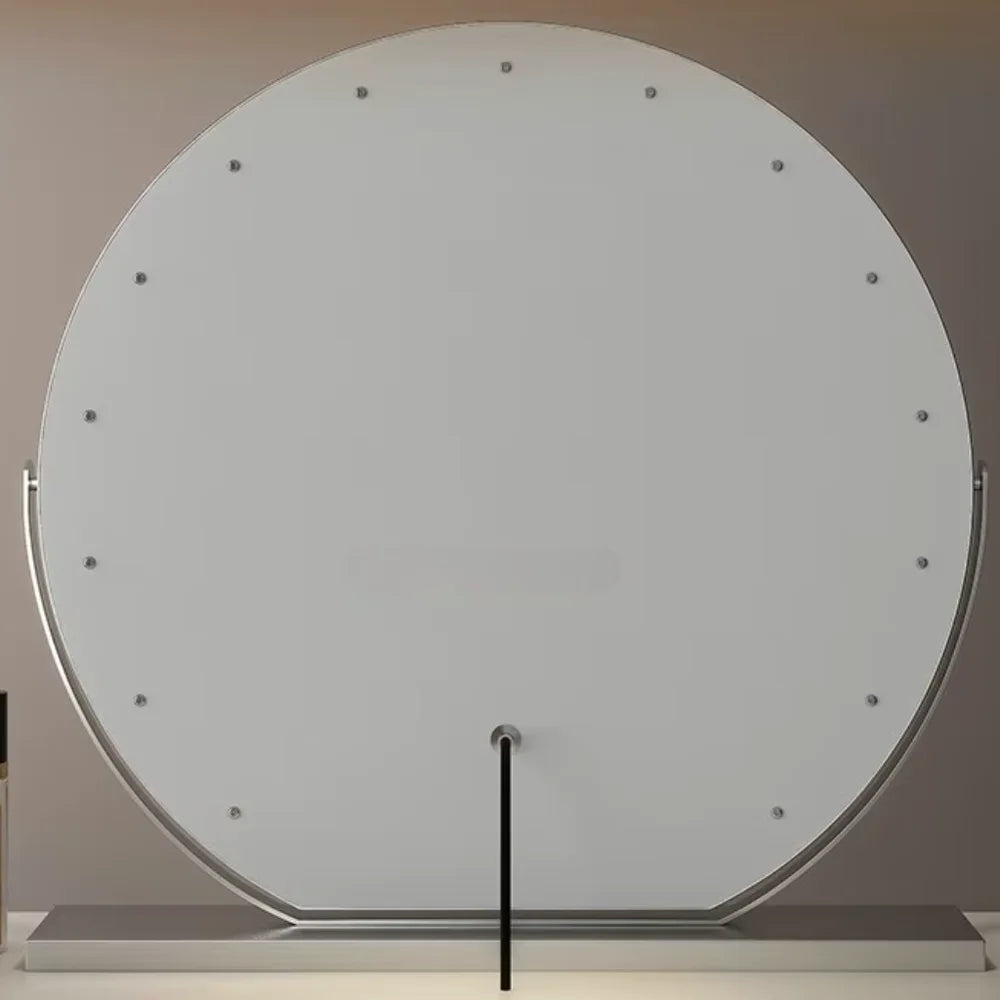 Lighted makeup mirror viewed at an angle to show the metal frame.