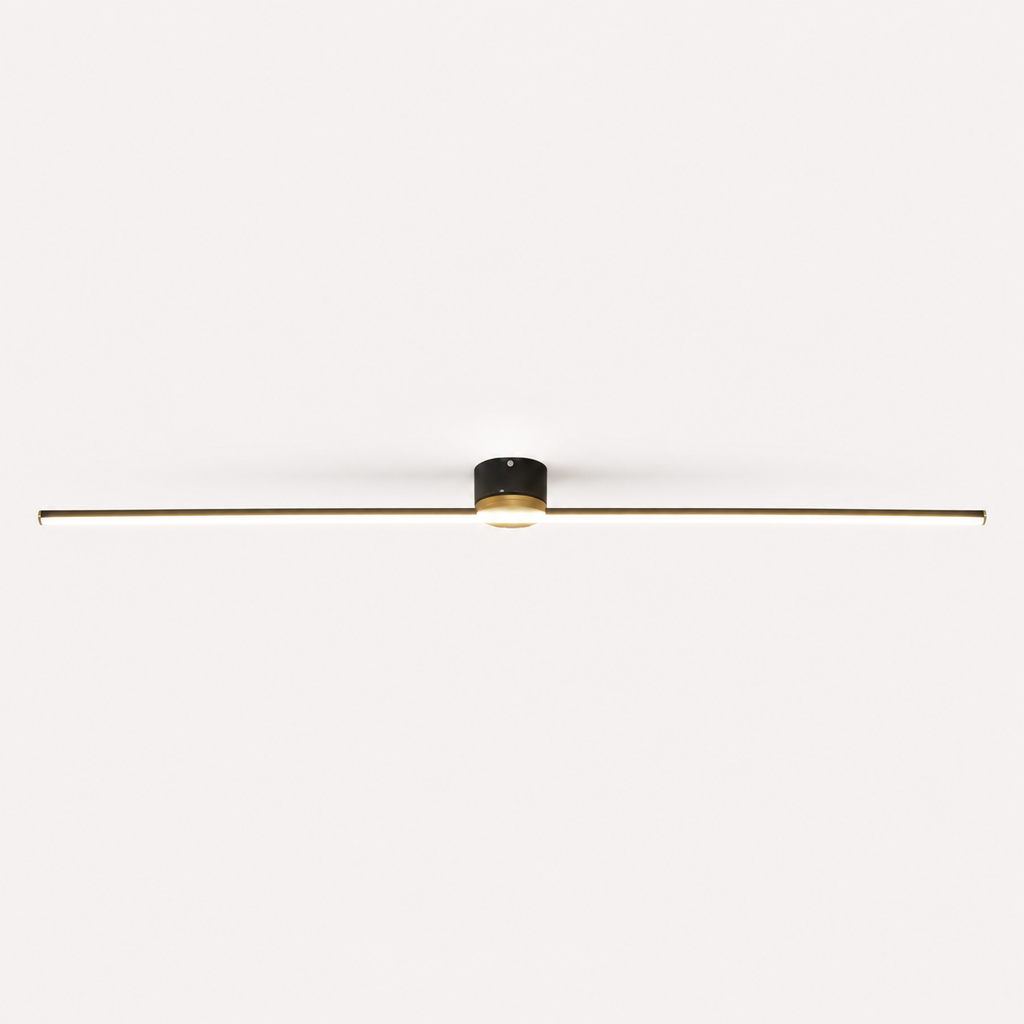 Black linear flush mount ceiling light glowing against a plain off-white background.