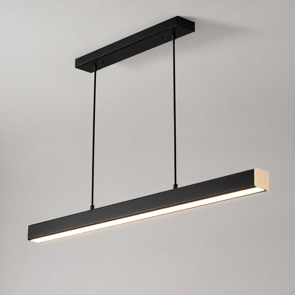 Black linear pendant light suspended from a matching ceiling canopy and glowing against a light gray background.