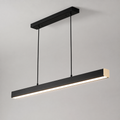 Black linear pendant light suspended from a matching ceiling canopy and glowing against a light gray background.