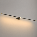Linear wall sconce with a black horizontal light bar casting warm light across a neutral wall.