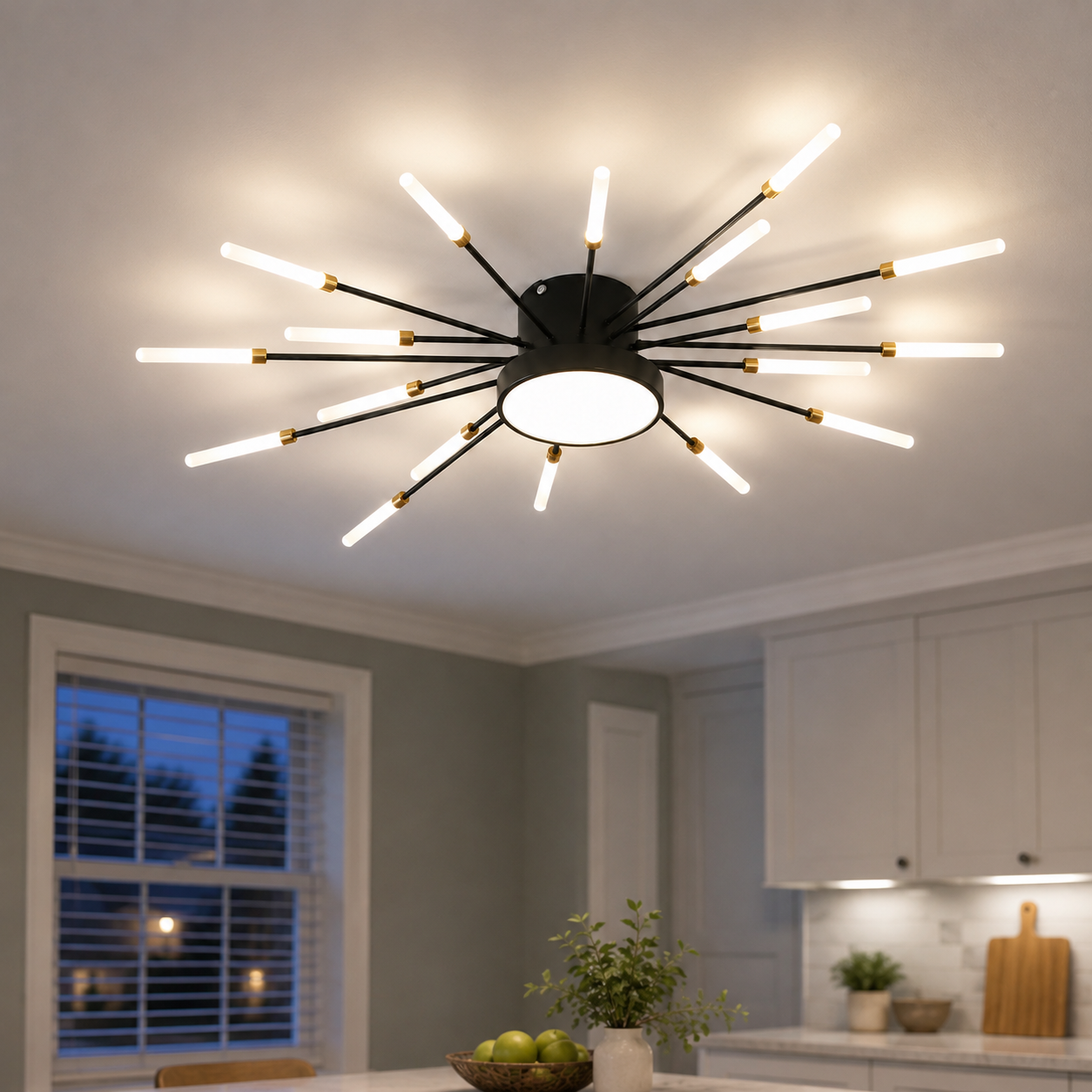 Black starburst ceiling light glowing in a light kitchen and dining area at dusk.