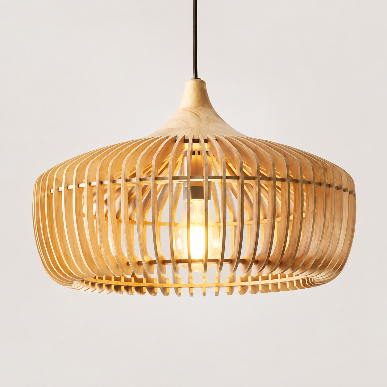 Natural wood slatted pendant light with a wide rounded shade and exposed glowing bulb on a neutral background.