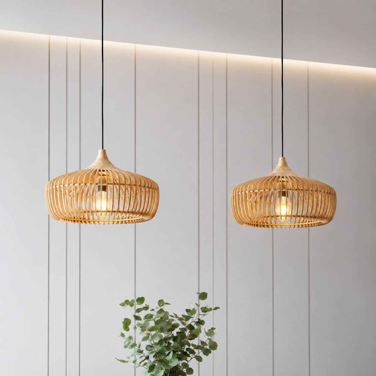 Two natural wood pendant lights with slatted dome shades hanging against a white paneled wall.
