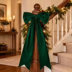 Long Velvet Christmas Bow — green bow on a stair railing