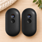 Two black magnetic rechargeable hand warmers with digital displays