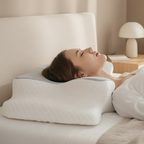 Memory foam pillow with a white contoured side supporting a woman lying on her back.