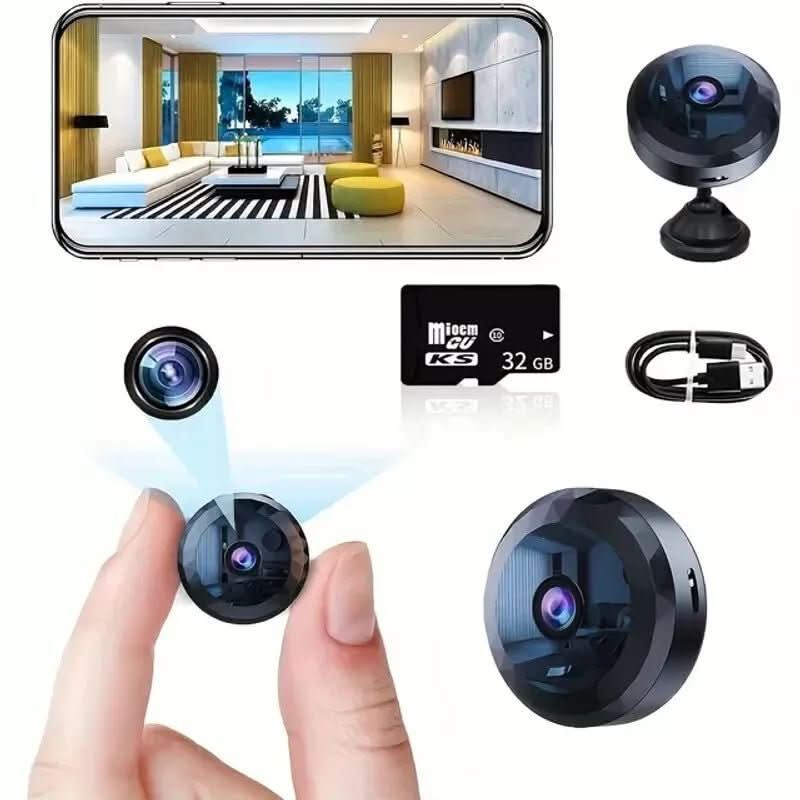 Mini WiFi security camera displayed with its USB charging connection.