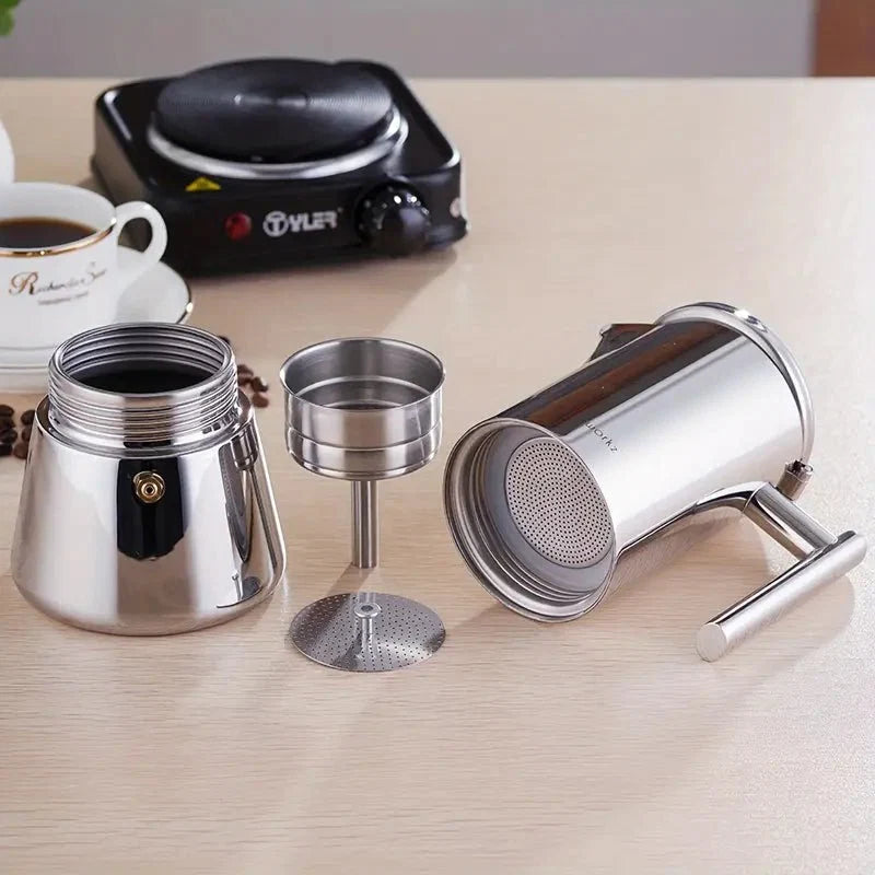 Italian moka pot shown with its heat-resistant black handle.