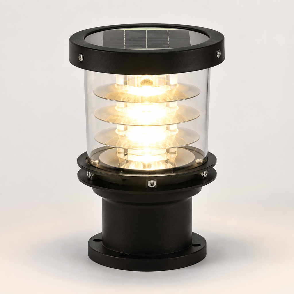 A solar-powered outdoor bollard light with a black metal frame, clear glass shade, and visible solar panel on top, glowing with warm light against a light gray background.