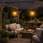 Two outdoor solar lanterns illuminate a wide pergola seating and dining area.