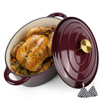 Burgundy oval Dutch oven with chicken and lid