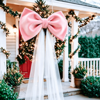 Oversized Christmas Bow — pink bow and white tulle tails outdoors