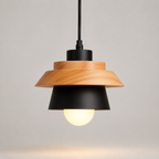Nordic pendant light with a wood top and aluminum shade centered on a plain background.