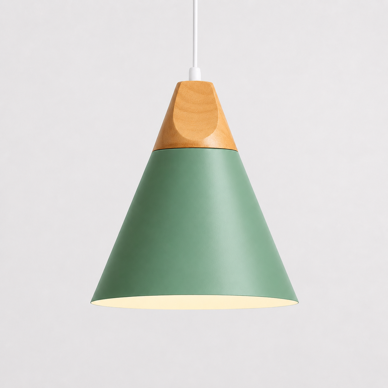 Green cone pendant light with natural wood accent, glowing against a light gray background.