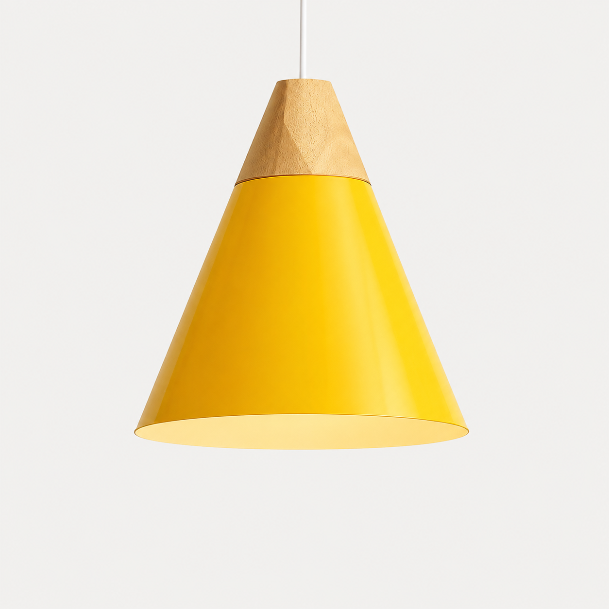Yellow cone pendant light with natural wood accent, glowing against a light gray background.