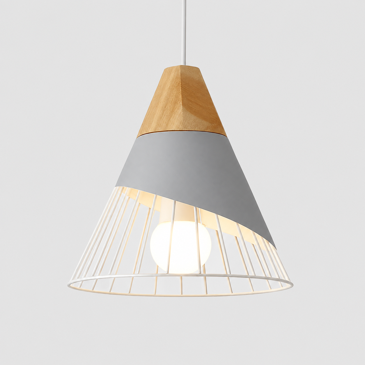 Gray cone pendant light with natural wood accent, glowing against a light gray background.