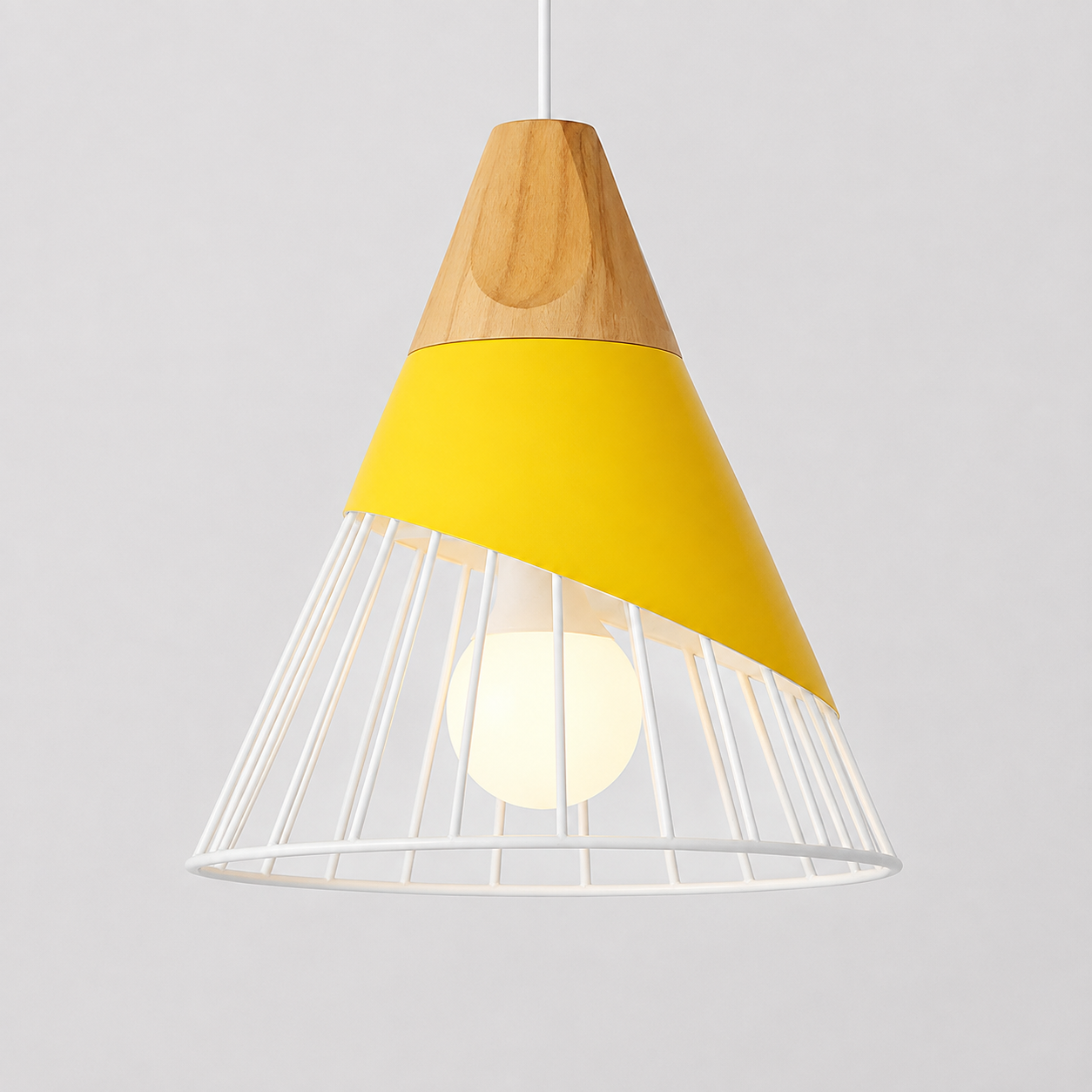 Yellow cone pendant light with natural wood accent, glowing against a light gray background.