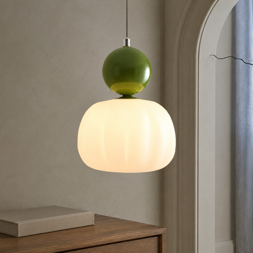 single green Bauhaus pendant light beside an arched window