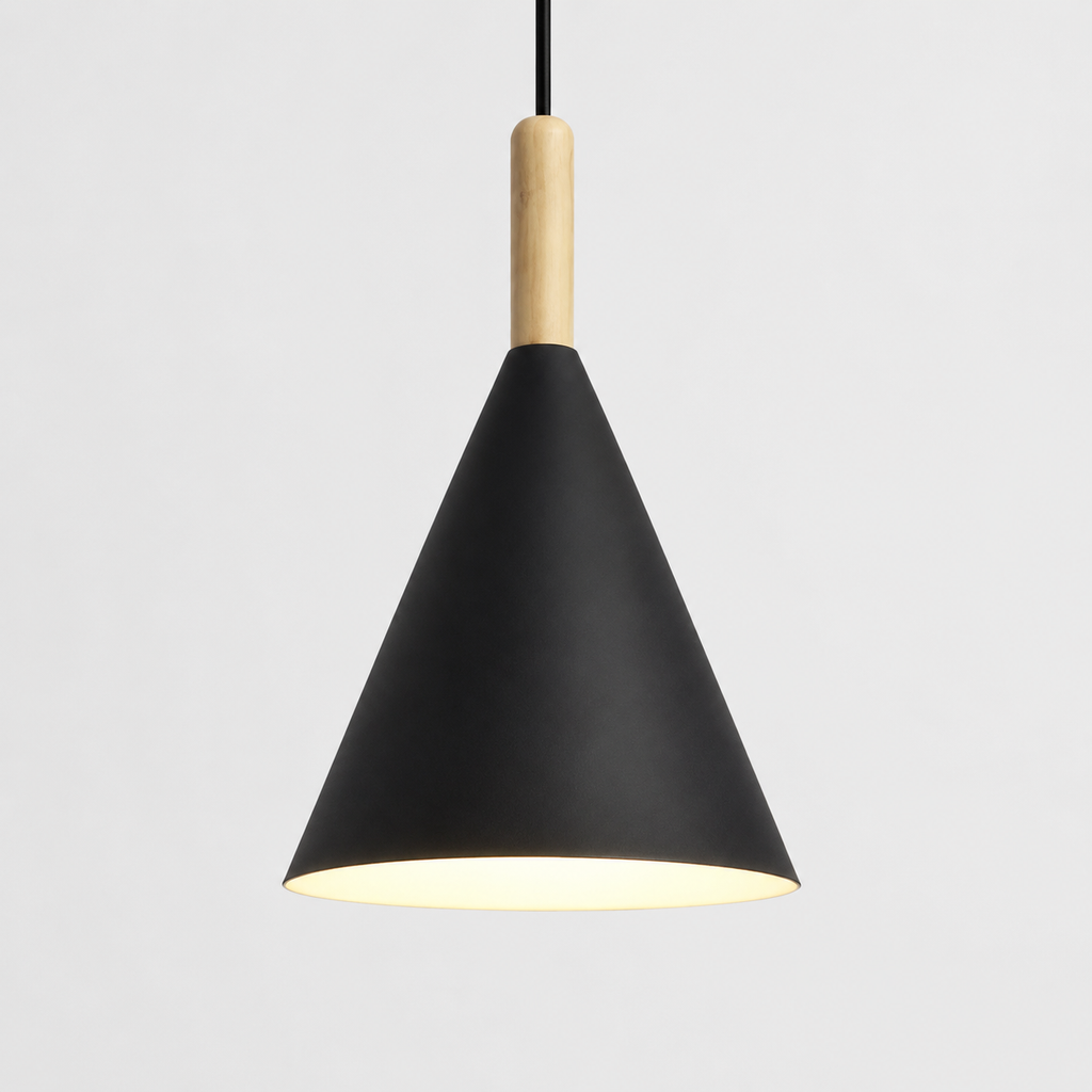 Black conical pendant light with a natural wood stem, glowing warm white against a neutral background.
