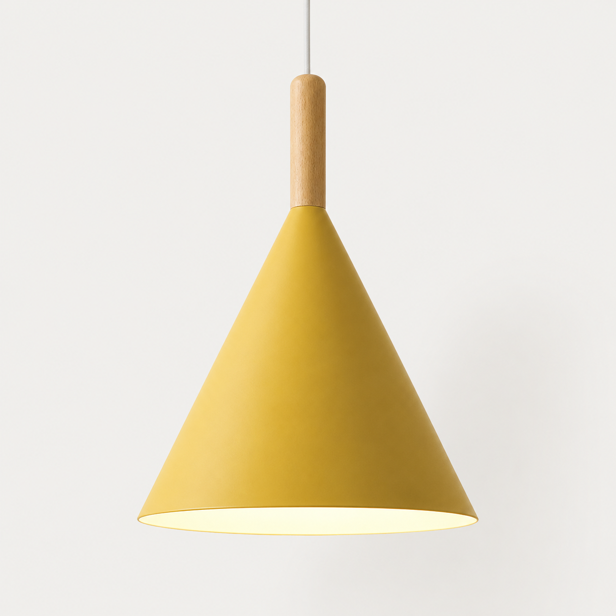 Yellow conical pendant light with a natural wood stem, glowing warm white against a neutral background.
