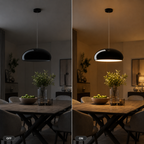 Black dome pendant light shown off and on above a dining table, with warm illumination in the lit view.
