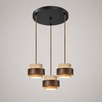 Pendant light with three hanging fixtures mounted to a round ceiling canopy on a white background.