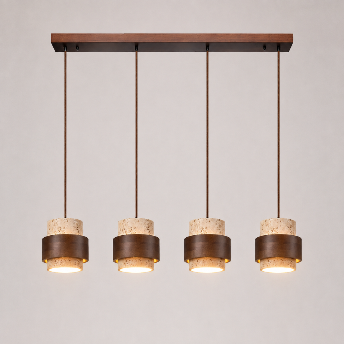 Pendant light with four hanging fixtures mounted to a rectangular ceiling canopy on a white background.