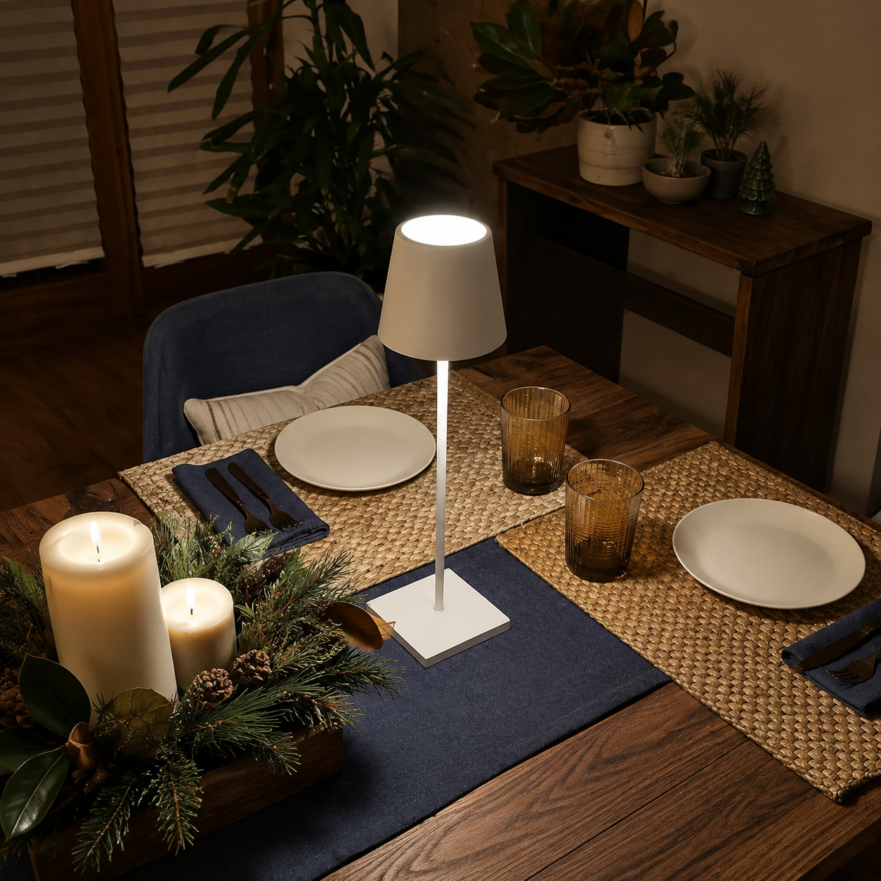 White portable table lamp lighting a winter dining table