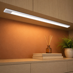 White motion sensor light illuminating a terracotta display niche