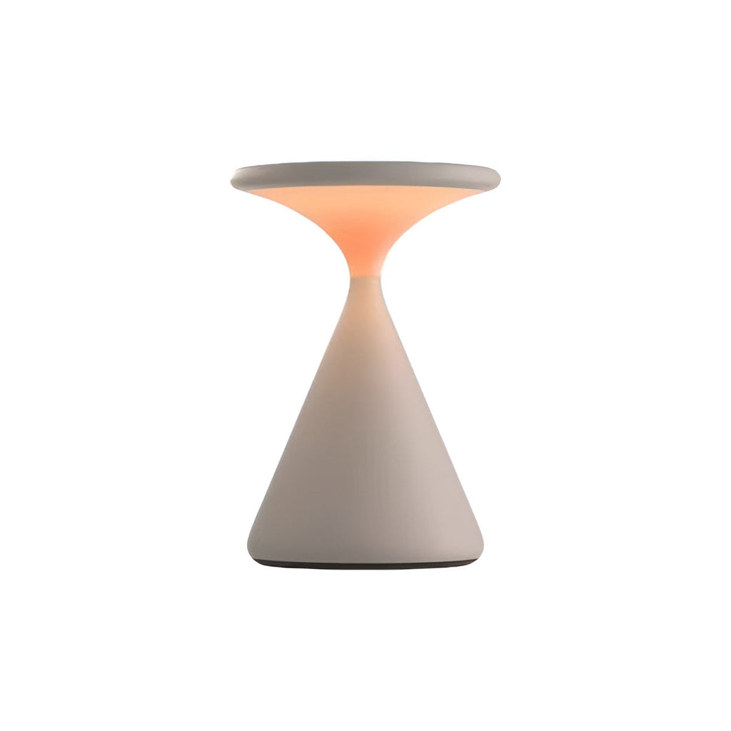 White rechargeable table lamp with a conical base and glowing disc shade.