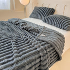 Dark Gray ribbed throw showing the hanging edge