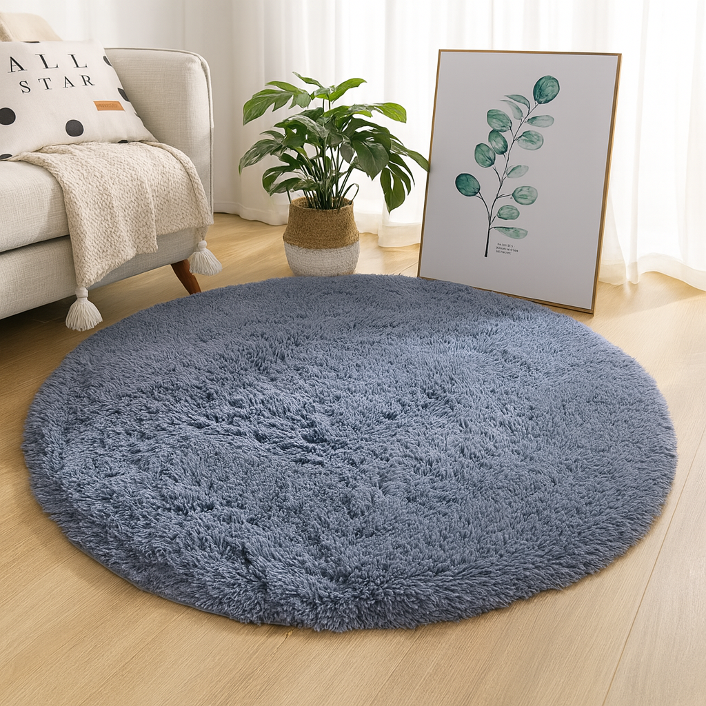 Blue round area rug with a soft circular silhouette.