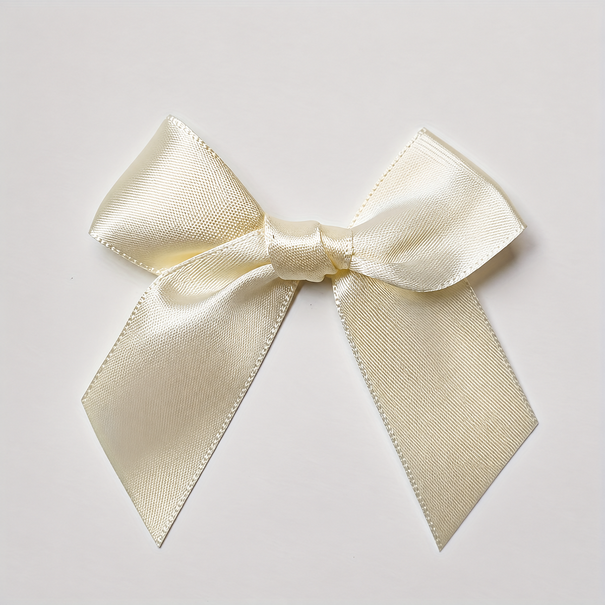 Satin Ribbon Bows — cream white satin bow front view