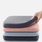 Seat cushion shown as a stack of gray, pink, blue, and navy colors.