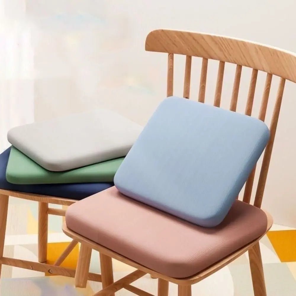 Seat cushion shown in several colors on dining chairs.