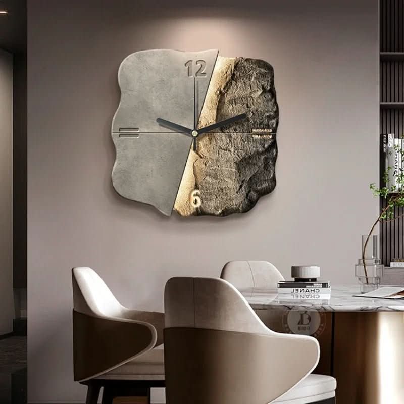 Beige relief wall clock displayed above a dining table