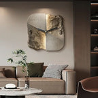 Brown geometric stone-effect wall clock above a modern sofa
