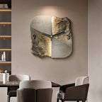 Sandstone-effect wall clock displayed in a neutral dining space