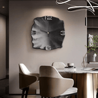 Black sculpted wall clock in a modern dining room